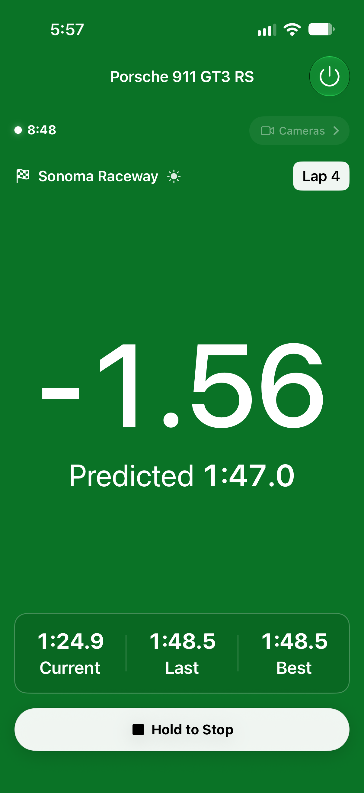 Trackside live lap timer showing a green delta, predicted lap time, and current, last, and best laps at Sonoma Raceway